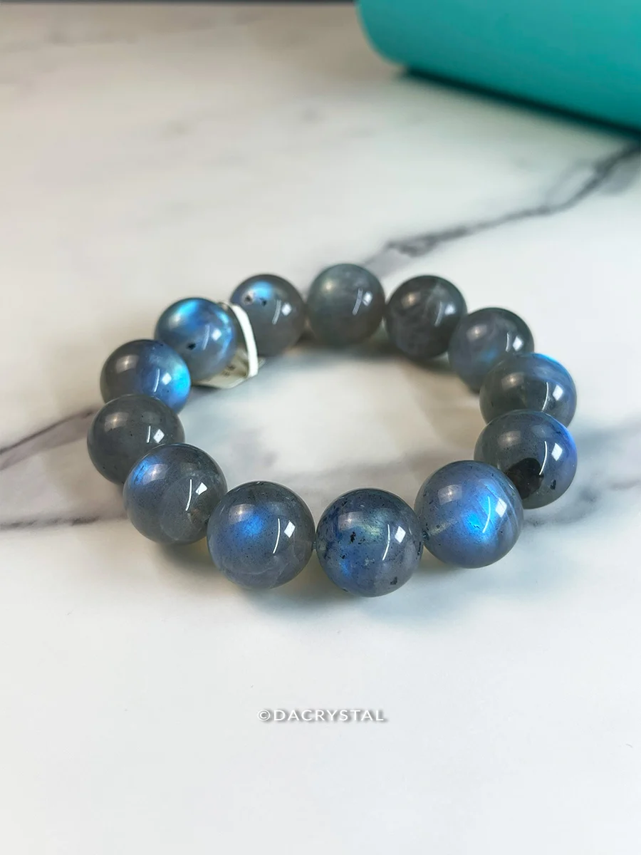 Labradorite crystal bracelet with shimmering blue and green flashes for energy protection