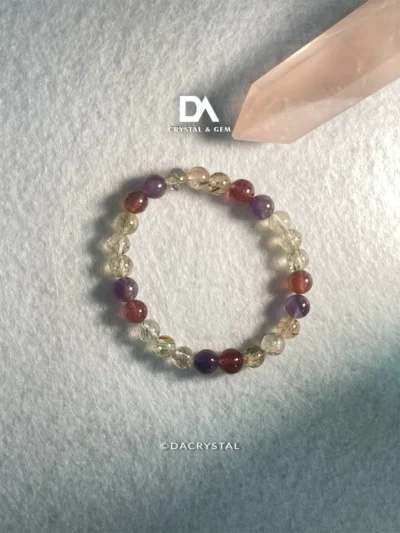 Radiant Spiritual Energy crystal bracelet with Black Gold Super Seven, Amethyst and Strawberry Quartz for awakening and joyful transformation