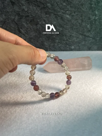 close up Super Seven Amethyst Strawberry Quartz bracelet beads healing crystal details