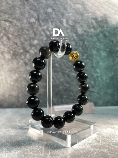 wearing abundance protection bracelet citrine obsidian for wealth attraction and negative energy cleansing